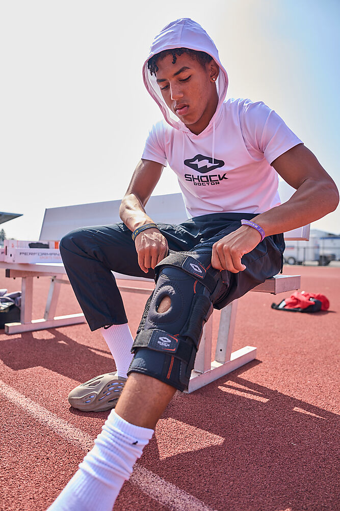 875-BK_Ultra Knee Support With Bilateral Hinges Black_Lifestyle 2.jpg