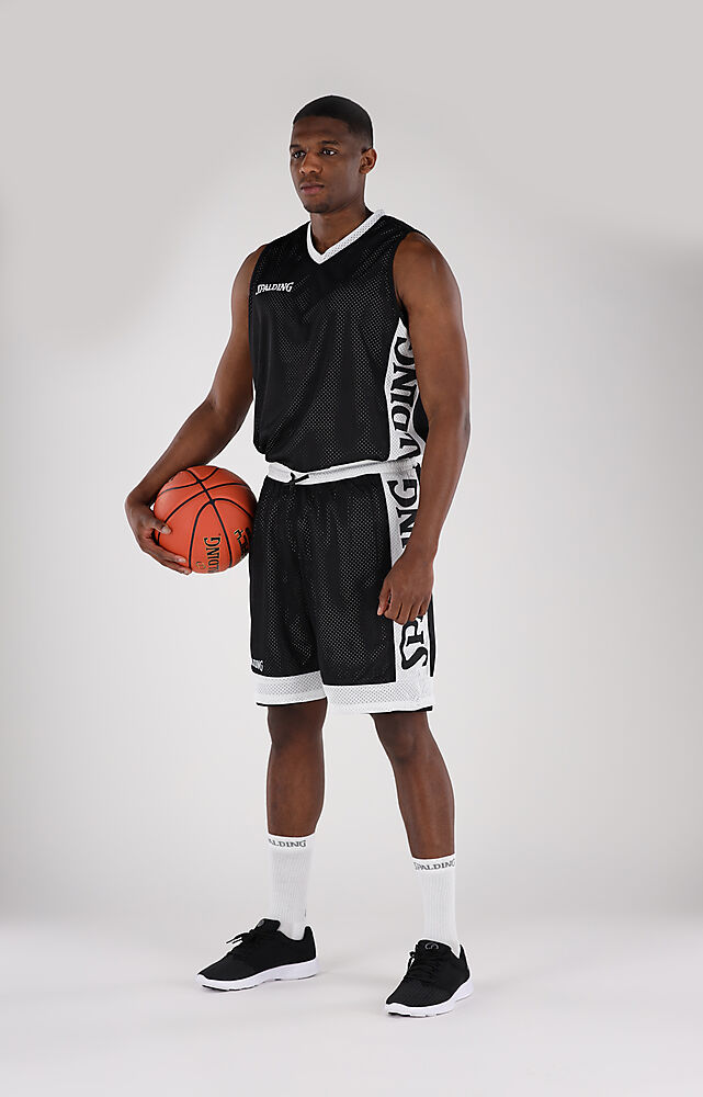 40221207_BKWH_Reversible Tank Top Black-White_onBody.jpeg