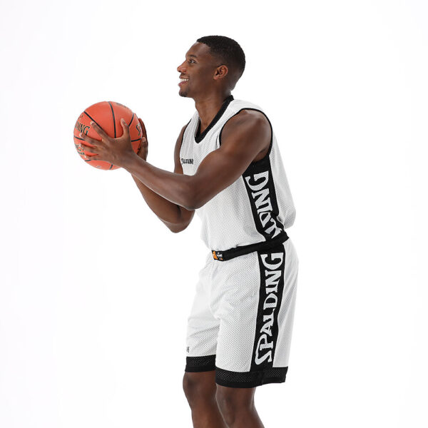 40221207_BKWH_Reversible Tank Top Black-White_onBody 8.jpeg