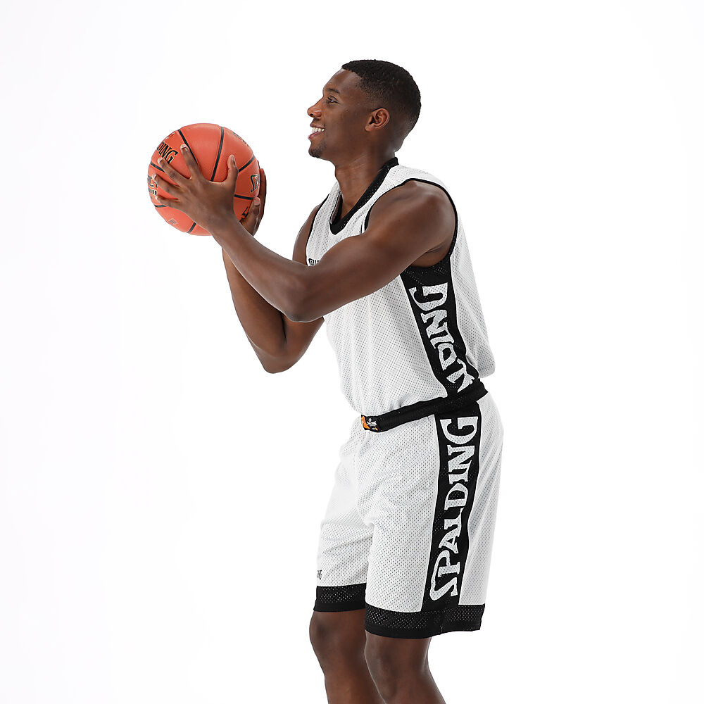 40221207_BKWH_Reversible Tank Top Black-White_onBody 11.jpeg