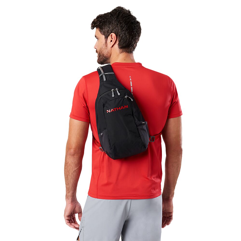 30430N-00186_Run Sling 8L Black-Ribbon Red_onBody 3.png
