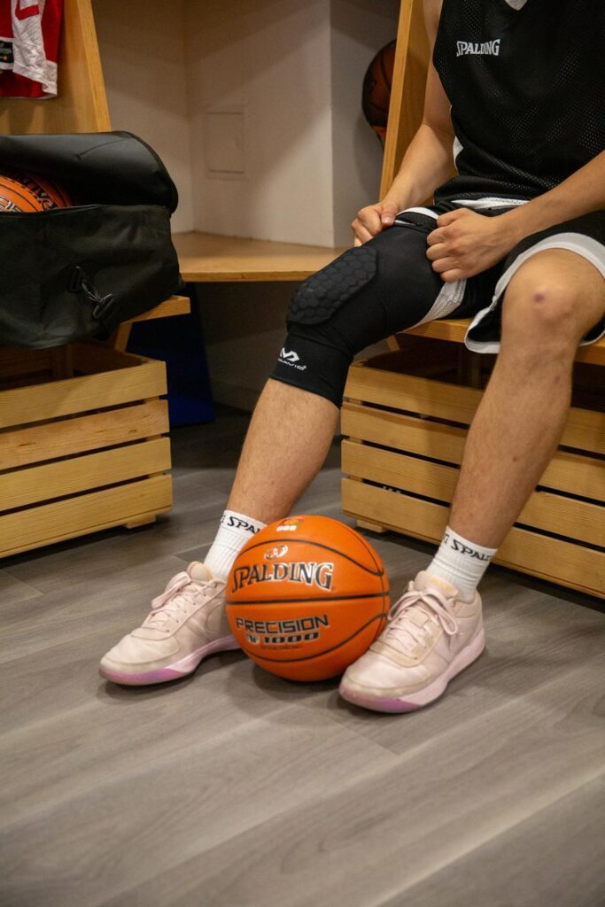 Basketballer putting on protective gear from McDavid